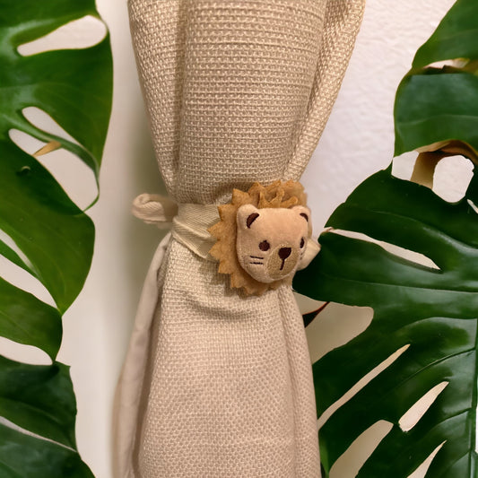 Mini lion head curtain tie back